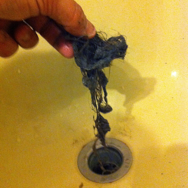 75 Pulling a big clump of hair out of the drain - 1000 Awesome Things